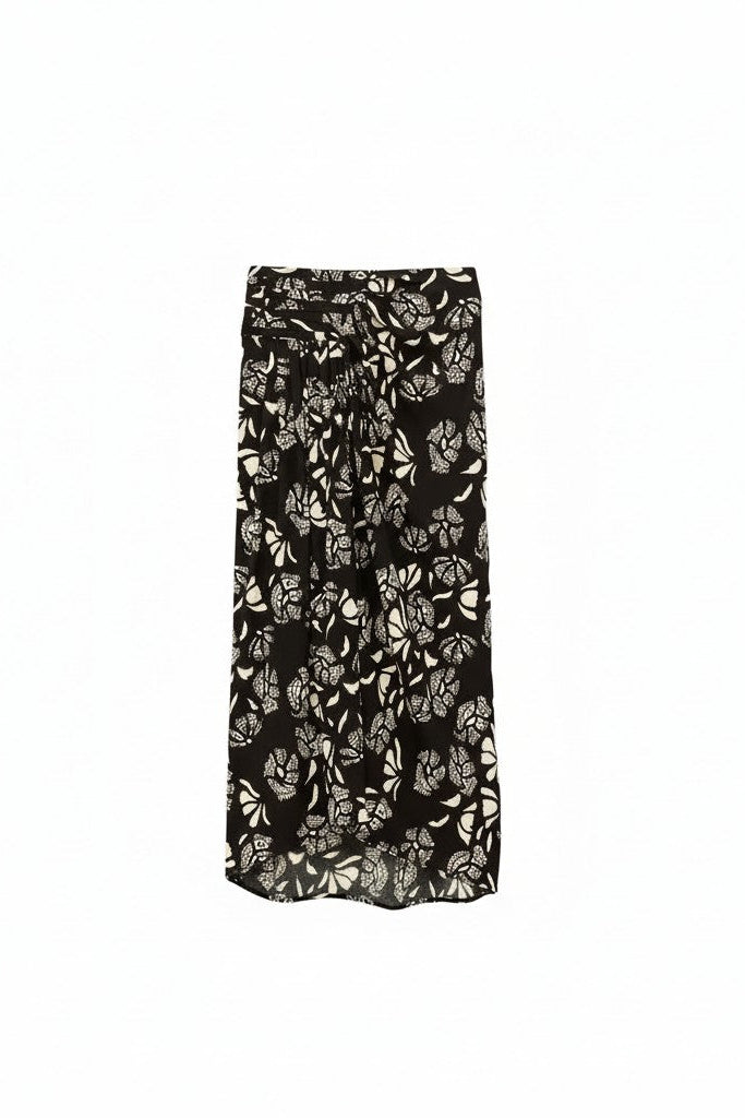 Black skirt with white floral pattern on a white background.