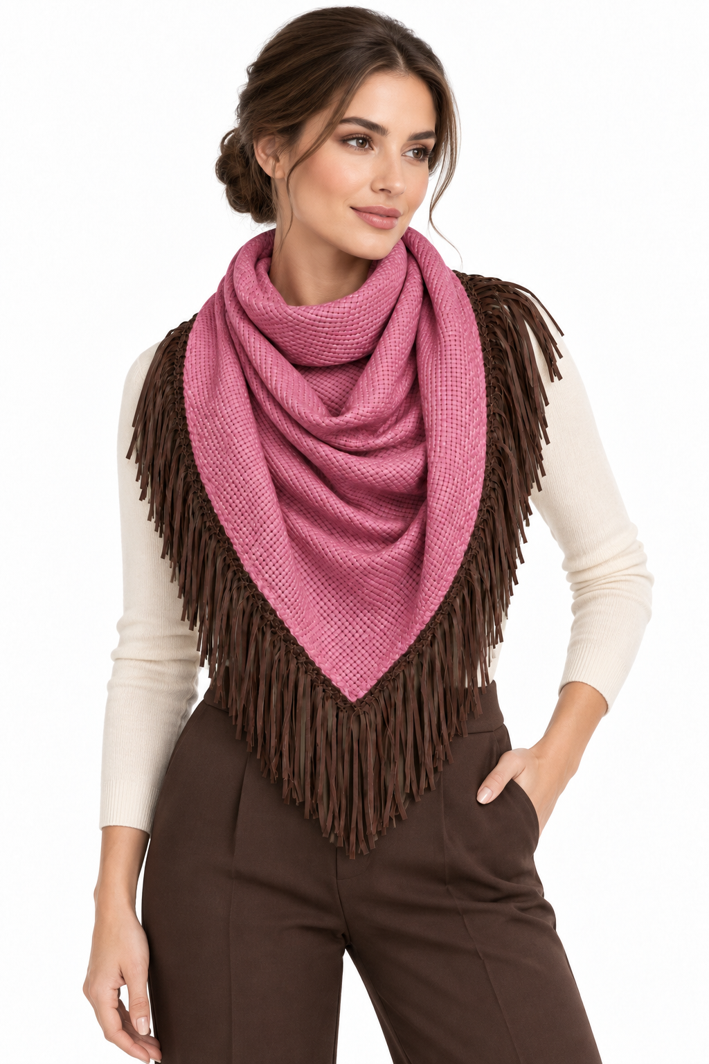 Front-facing model wearing a dusty rose-pink triangular Bajra scarf with dark chocolate braided trim and long fringe over a taupe top.