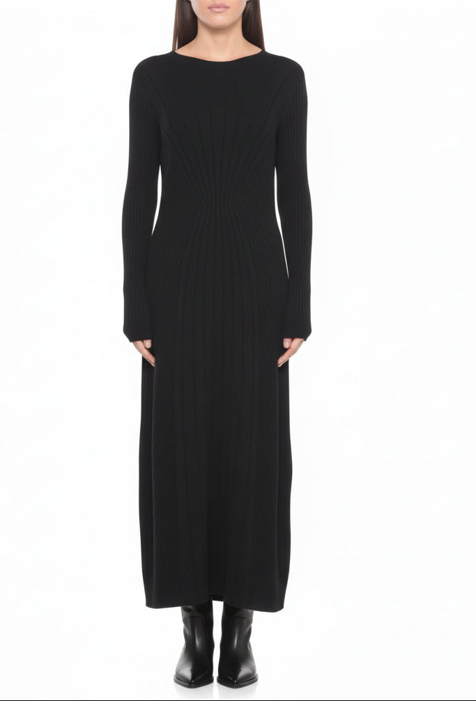 Black long-sleeve dress worn by a woman on a white background.