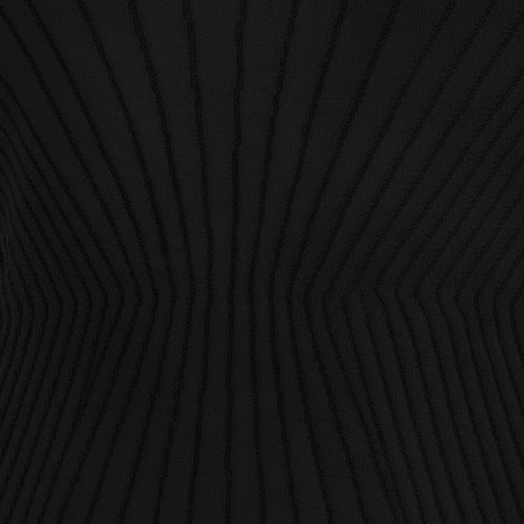 Black textured fabric pattern for D.Exterior dress.