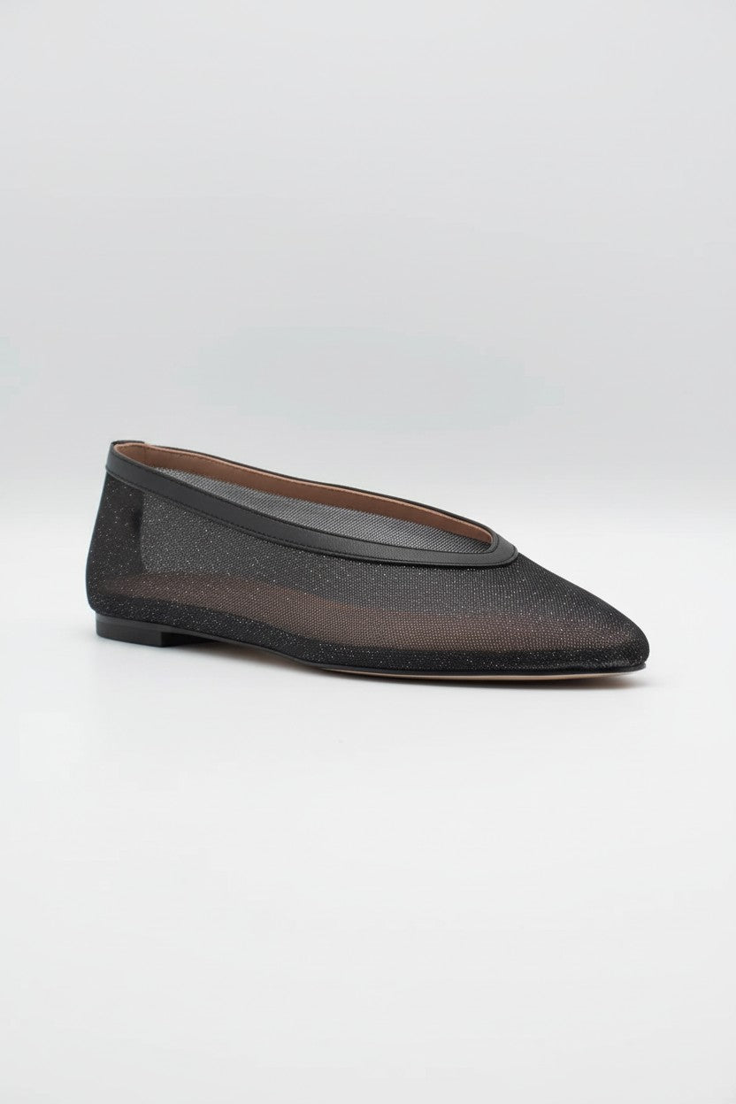 Black mesh flats on a light background.