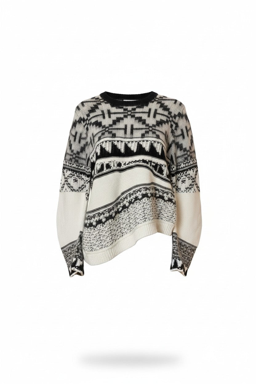 Black and white pattern sweater on a white background.