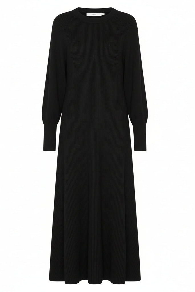 Black sweater dress with long sleeves on a white background.