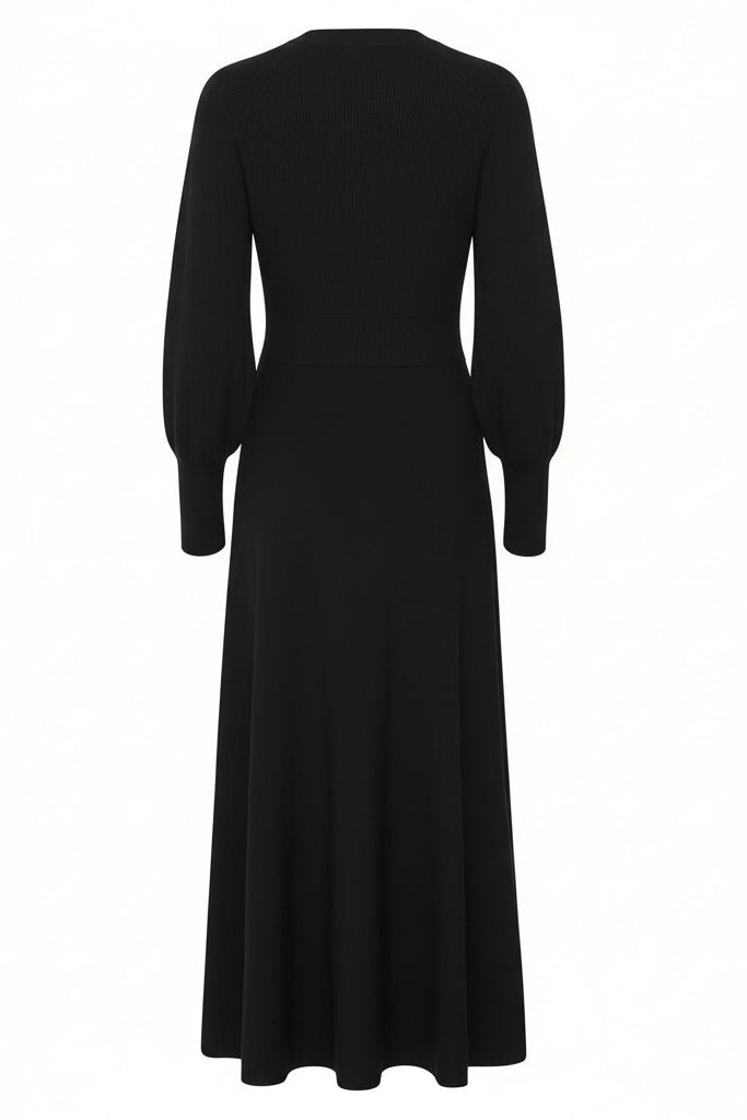Back of a black long-sleeve sweater dress on a white background.