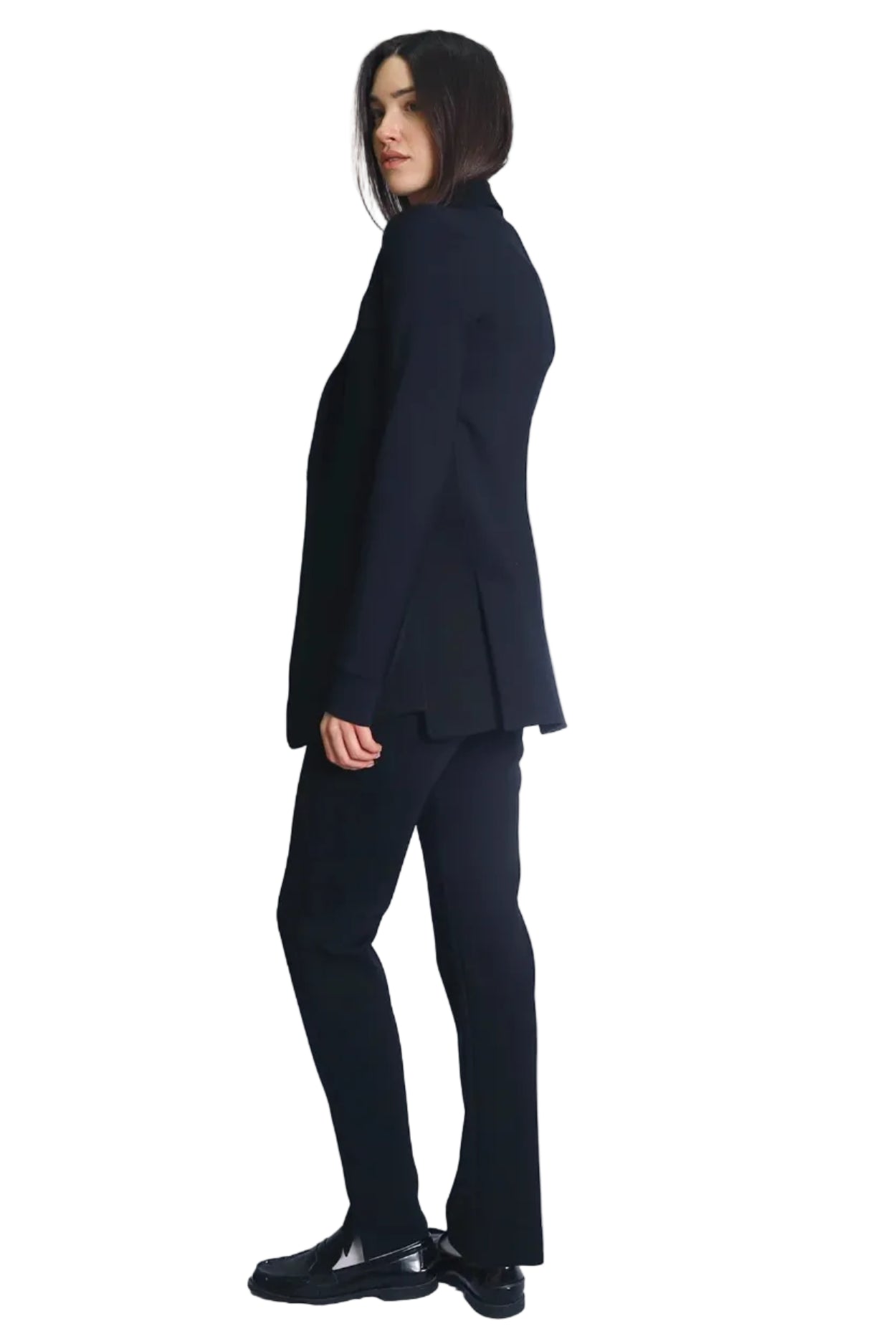 Person wearing a black suit on a white background.