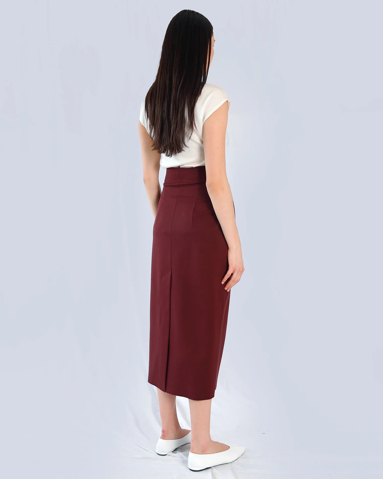 Marie Saint Pierre Tarselle burgundy high-waisted midi skirt, back model view