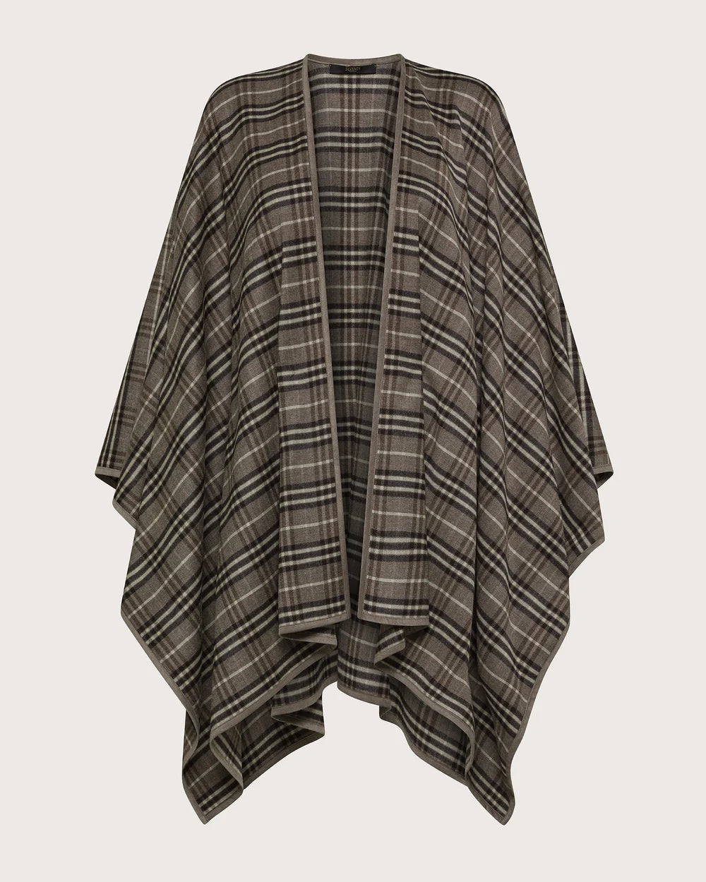 Plaid poncho on a light gray background.
