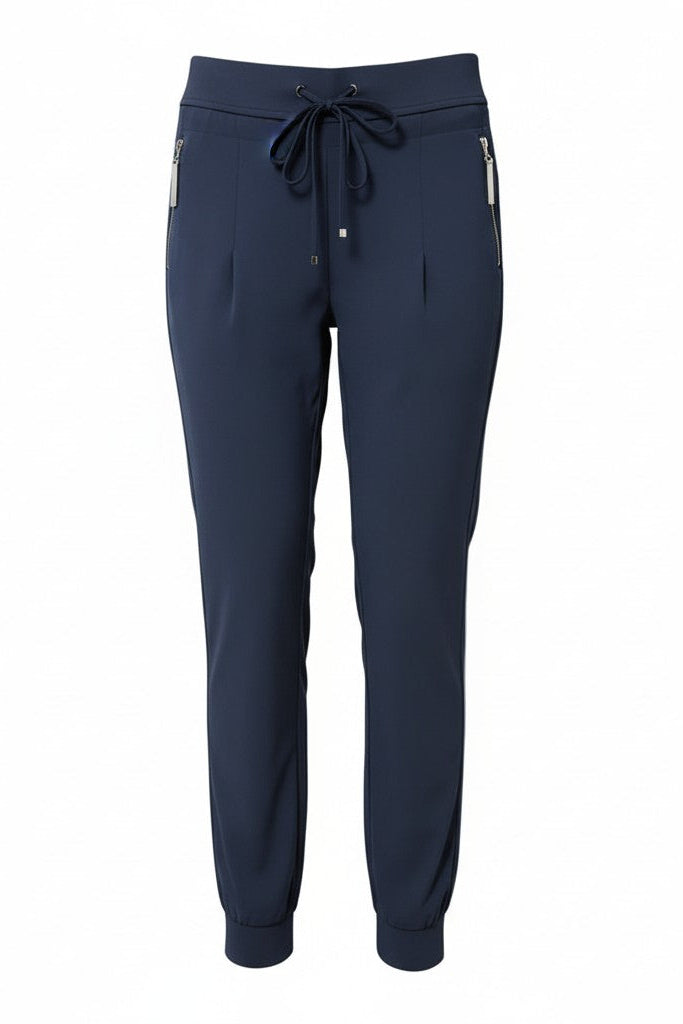 Navy blue pants with a drawstring on a white background