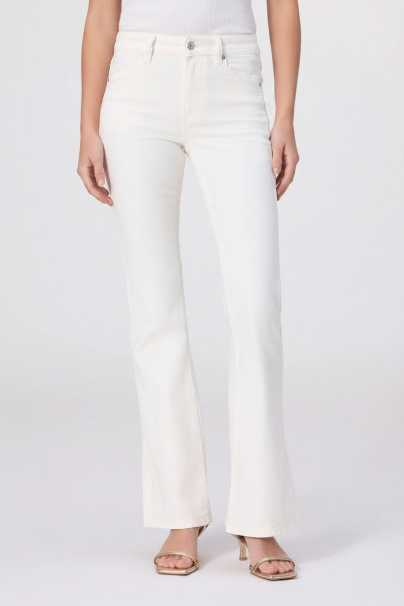 White jeans worn by a woman on a white background.