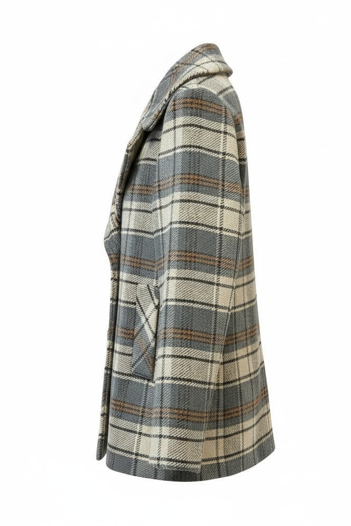 Side view of a plaid coat on a white background.