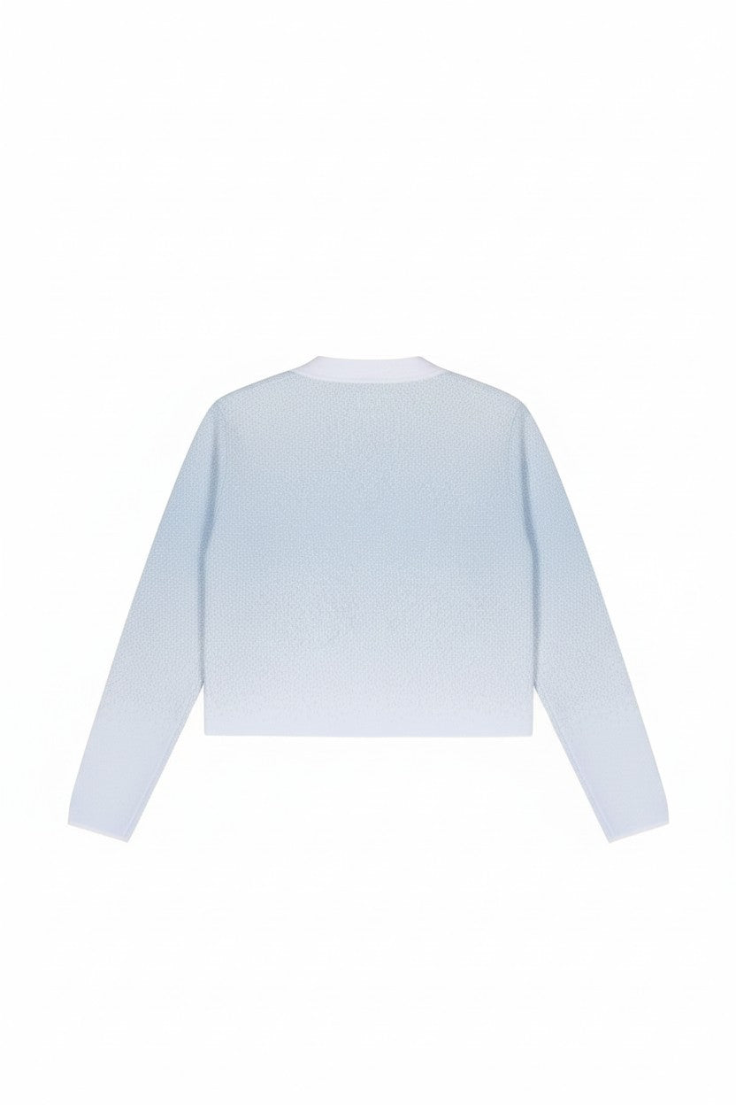 The back of a blue sweater on a white background.