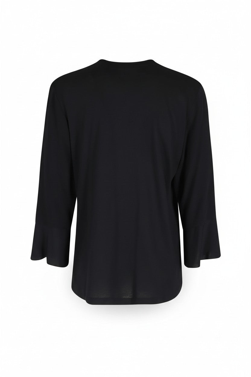 The back of a black long-sleeve top on a white background.