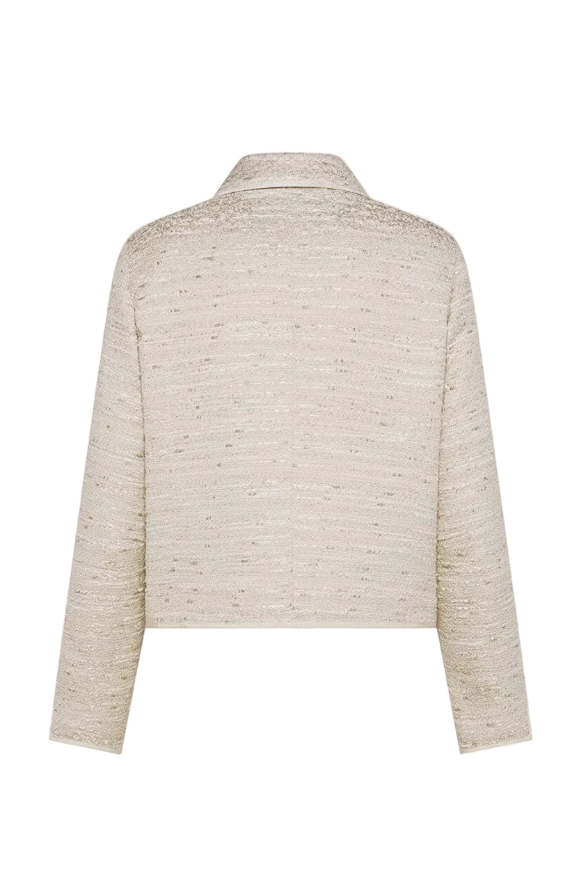 The back of a beige textured jacket on a white background.