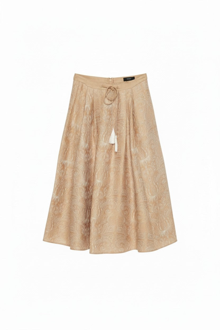 Beige paisley skirt on a white background.