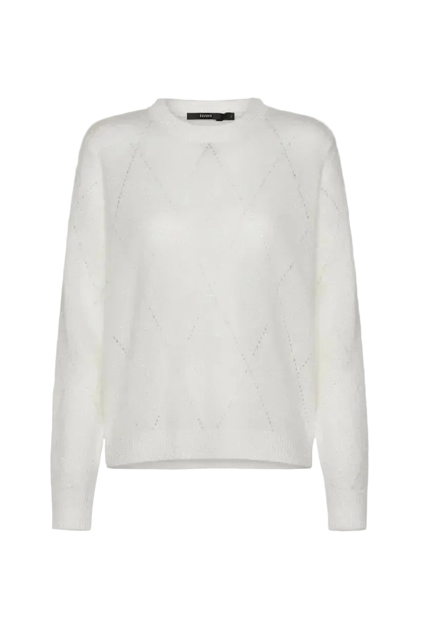 White sweater with diamond detailing.