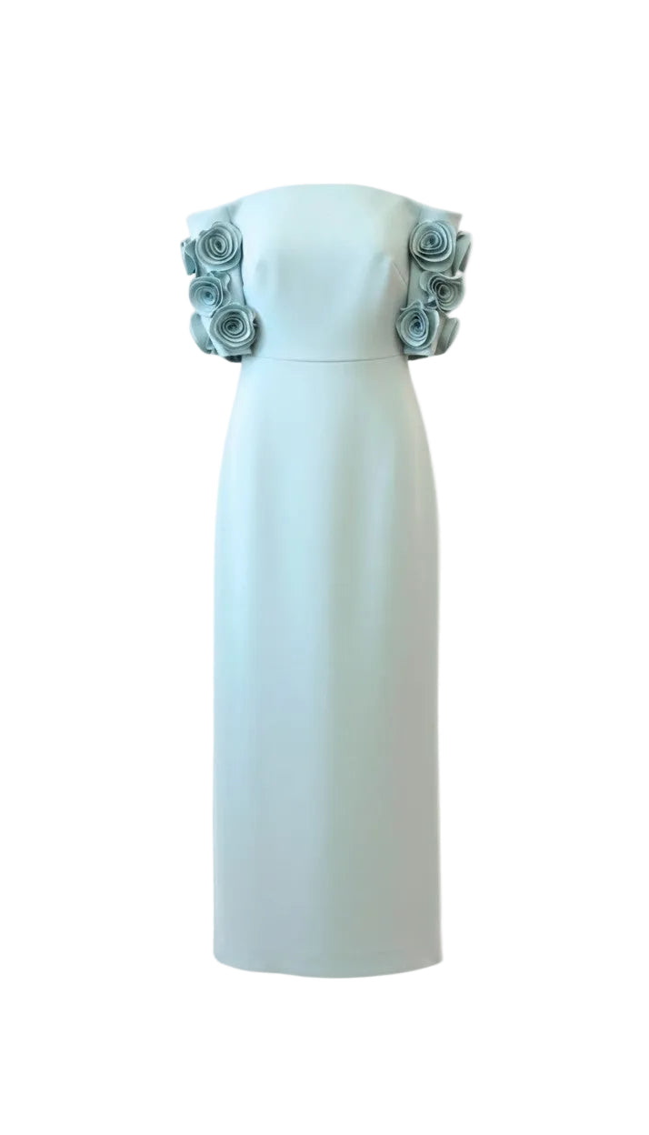 Minty blue strapless dress with floral embellishments on a white background.