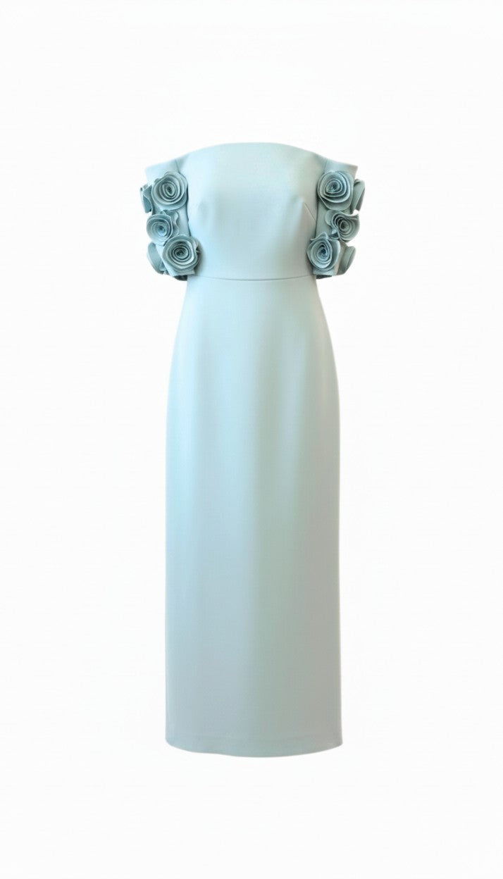 Minty blue strapless dress with floral embellishments on a white background.