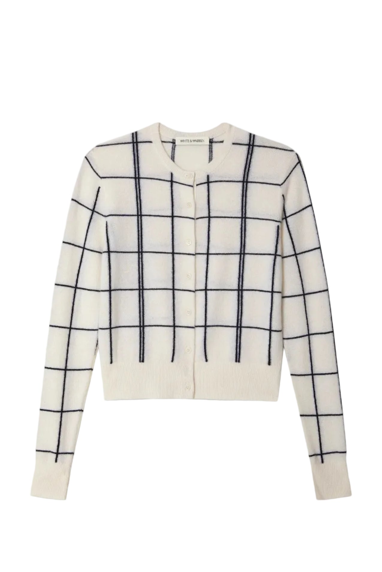 White cardigan with navy grid pattern on a white background.