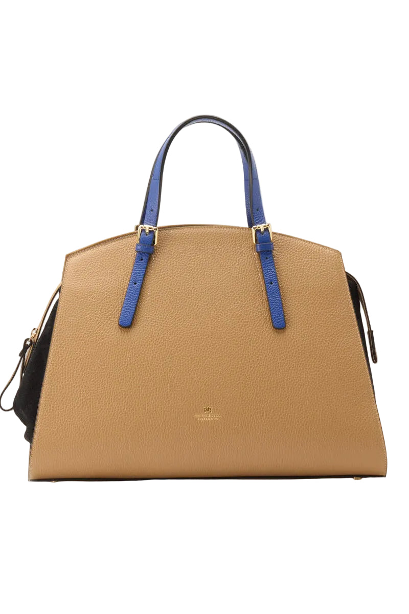 Tan handbag with blue straps on a light gray background