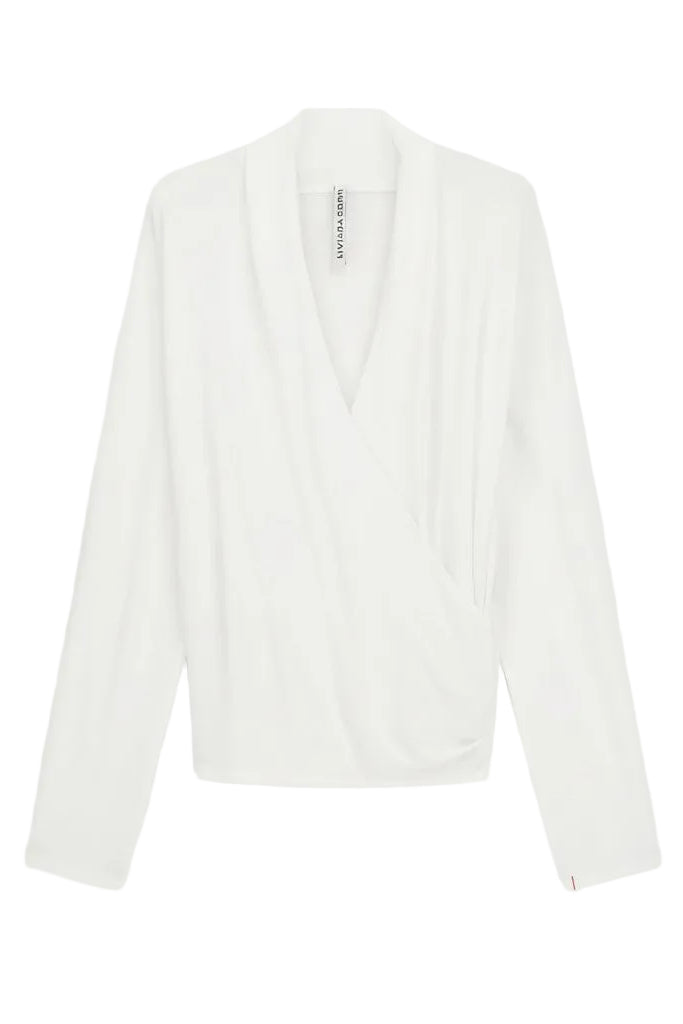 White sweater top with scoop neck.