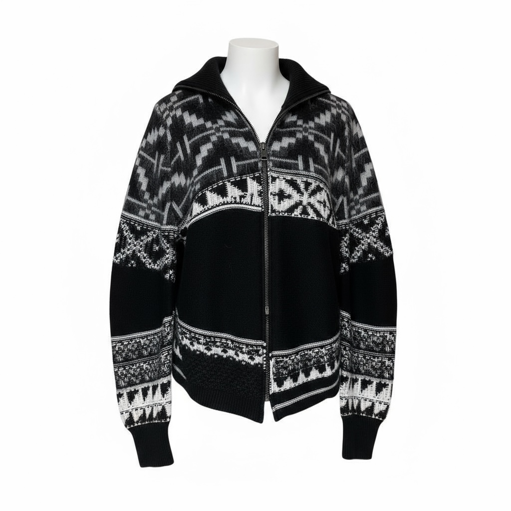 Black and white patterned zip up sweater on a mannequin against a white background.