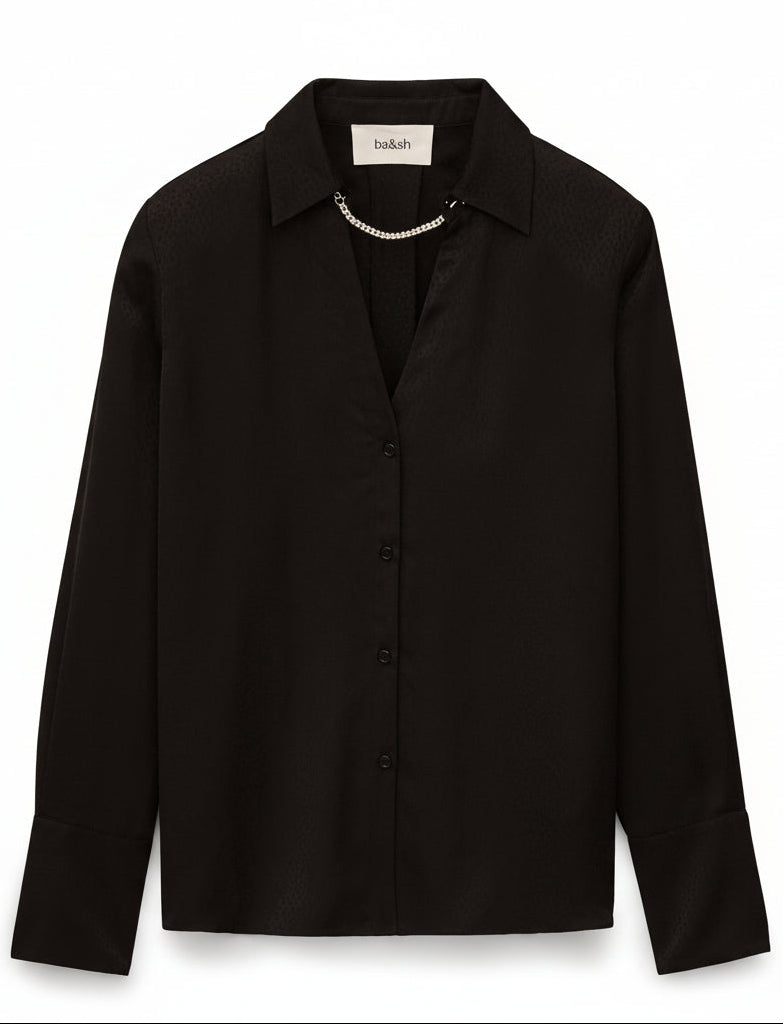 Black blouse on a white background.