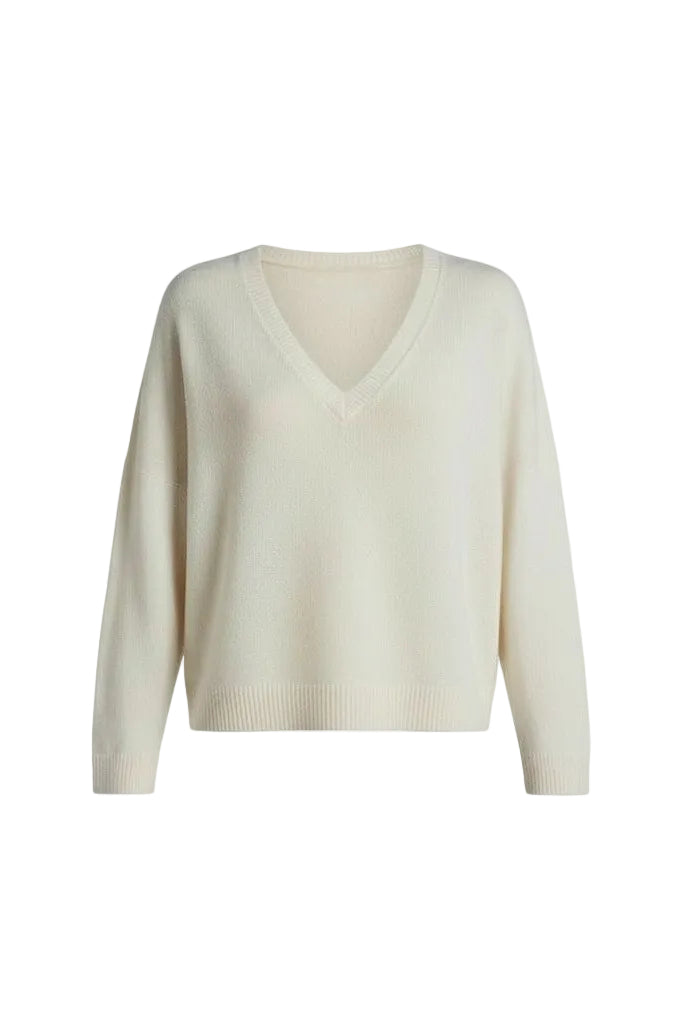 Off white sweater on a white background.