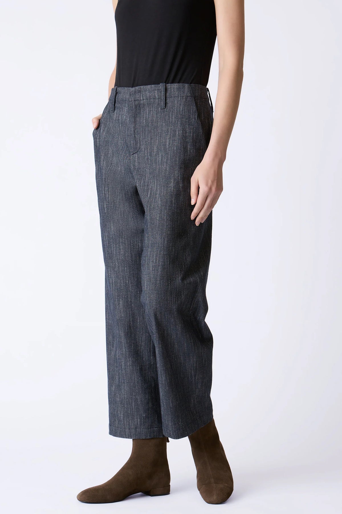 Side view of the Kal Rieman Joni Pant showing its structured waistband, straight stove-pipe silhouette and cropped length.