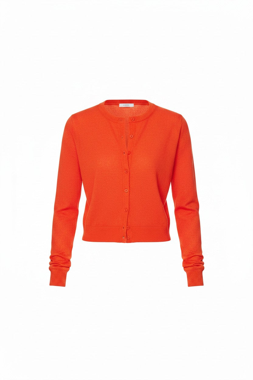 Orange cardigan on a white background.