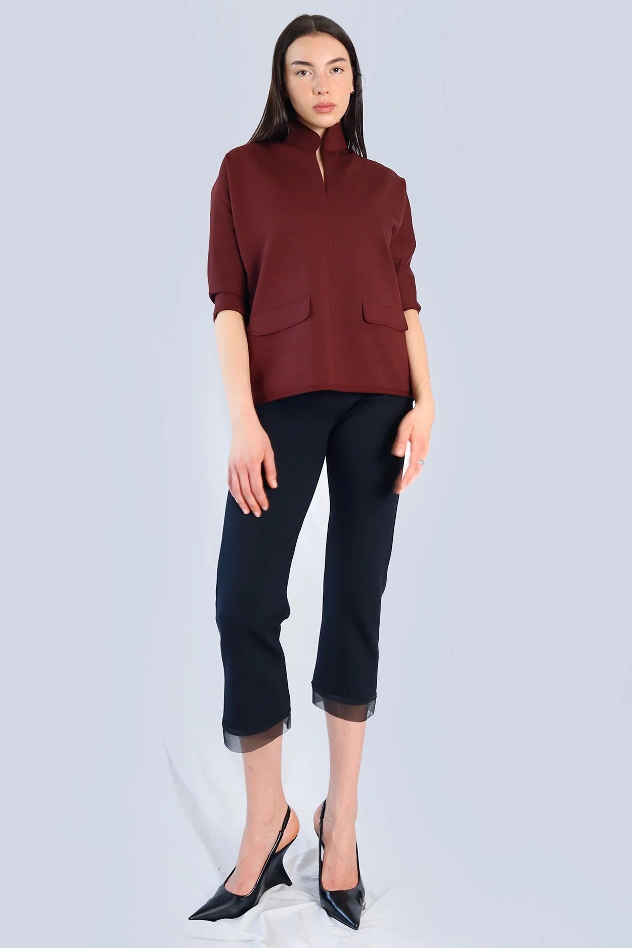 Marie Saint Pierre Helma burgundy high-collar top, three-quarter model view