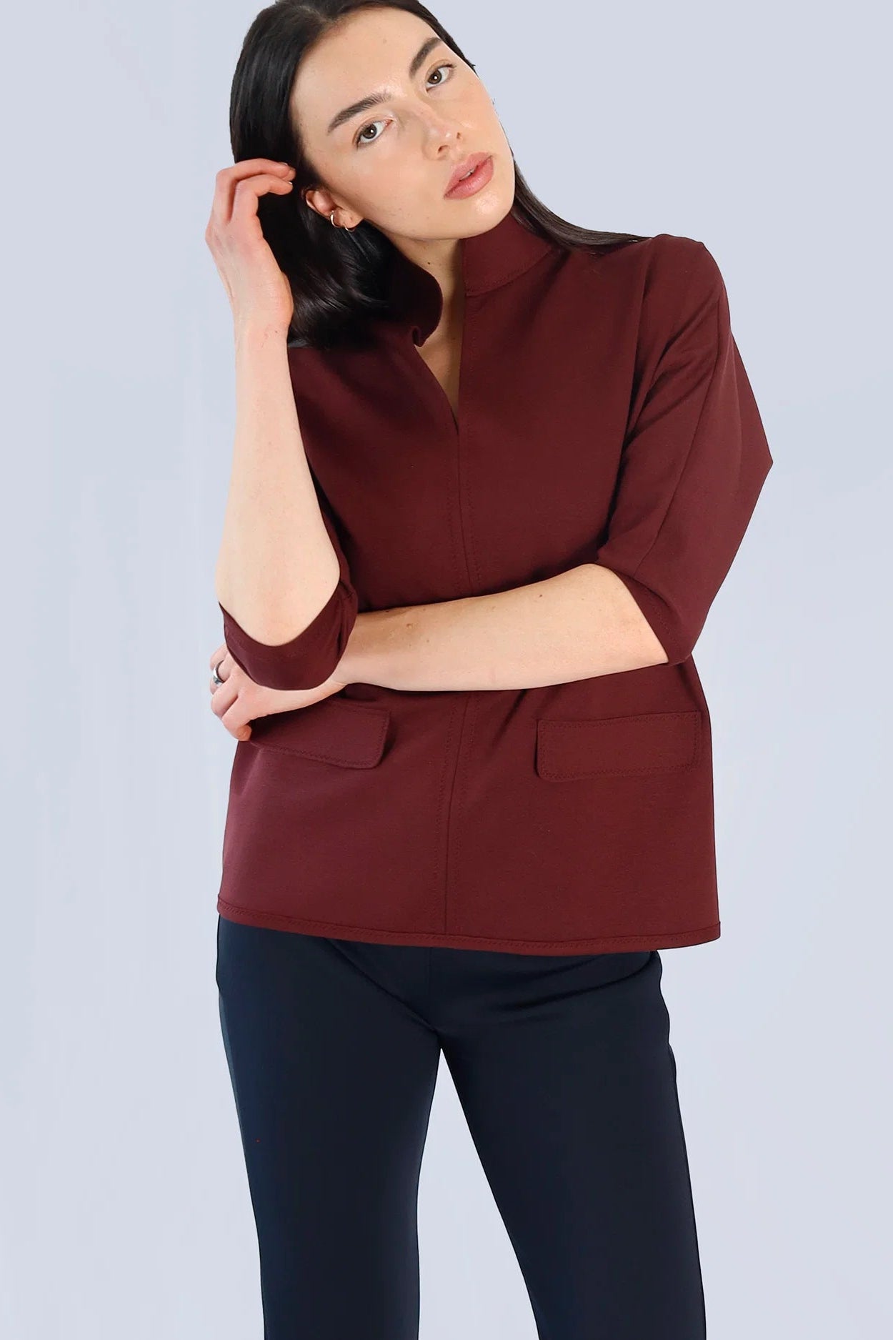 Marie Saint Pierre Helma burgundy high-collar top, close-up model view