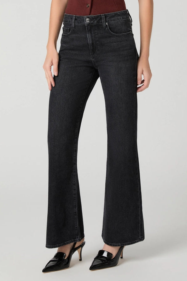 Angled front view of PAIGE Sofia black flare jeans showing the slim fit and softly flared legs.