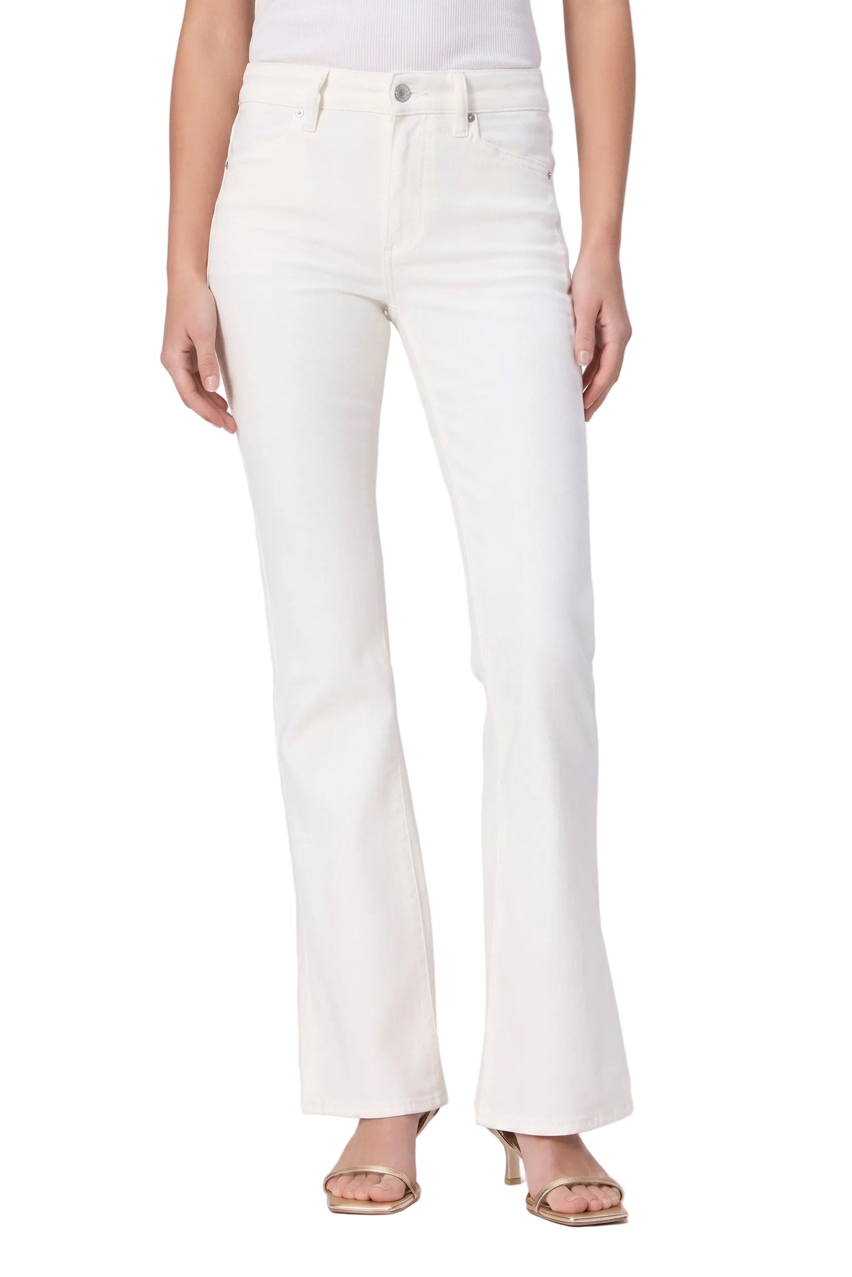 Bottom half of a woman wearing a pair of white jeans on a white background.