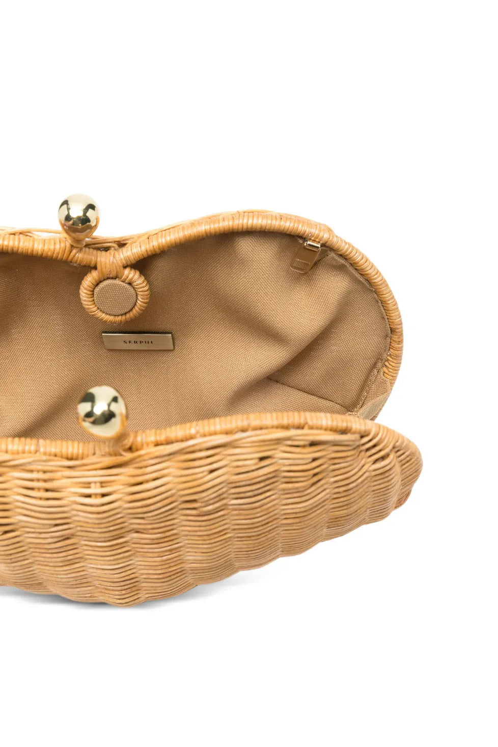 Wicker clutch bag with gold accents on a white background.