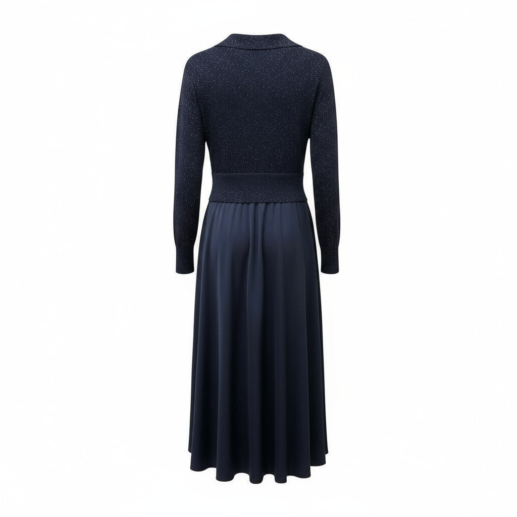 Back of a navy blue dress with long sleeves on a white background.