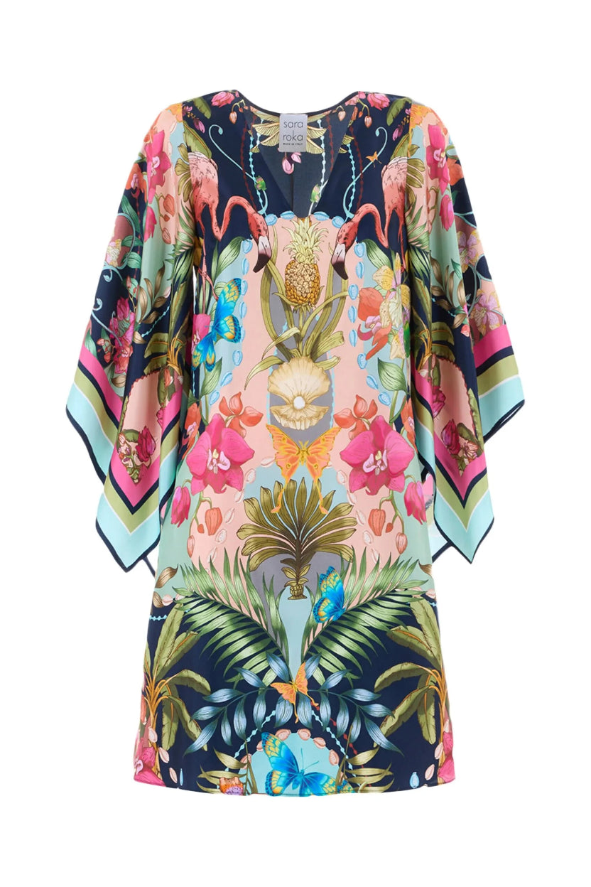 Colorful kimono-style dress with tropical floral design on a white background.