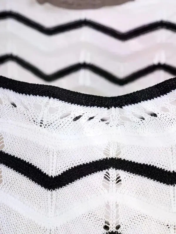 Close-up of a black and white patterned fabric with zigzag design.