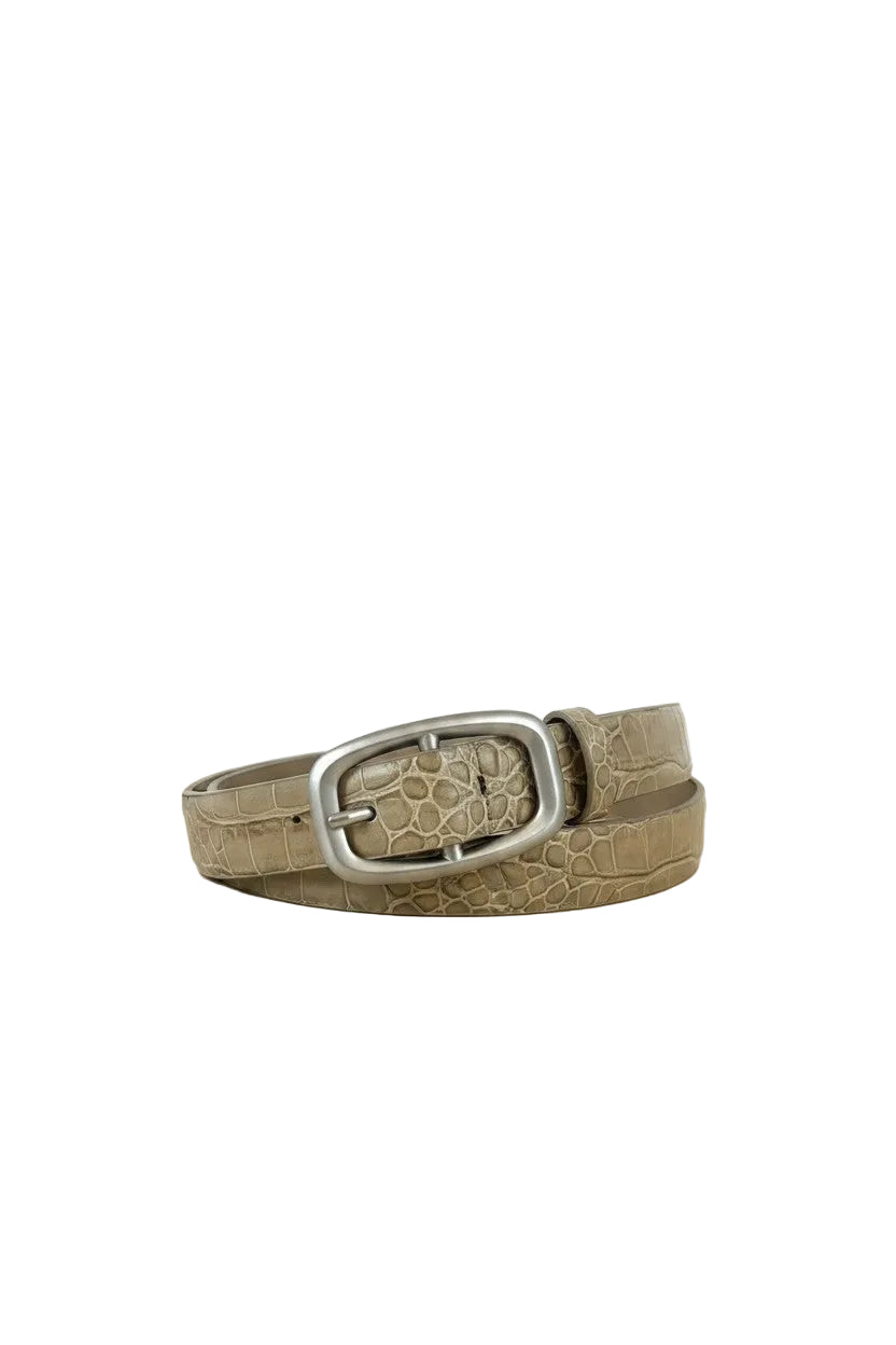 Brown leather belt with a silver buckle on a light wooden surface.