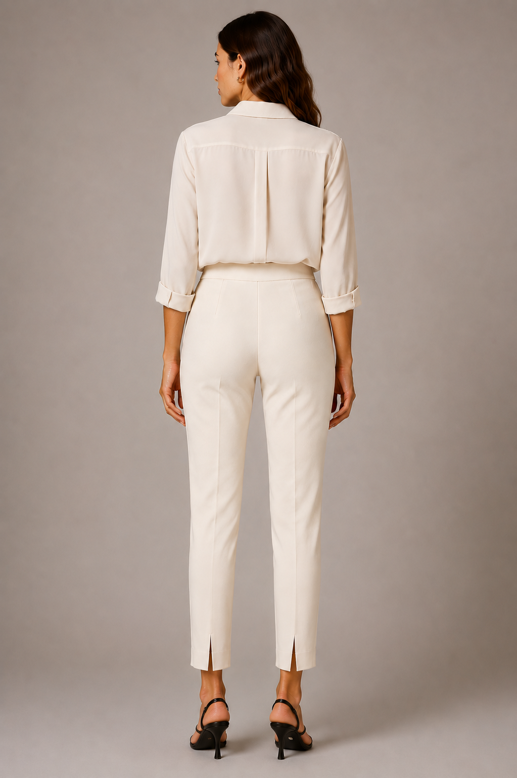 Model wearing the ivory Peserico Bi-Stretch Canvas Pant from the back, showing the small back hem slits.